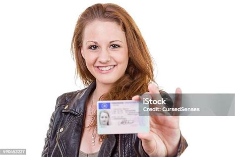 Young Woman Showing Her Drivers License Stock Photo Download Image