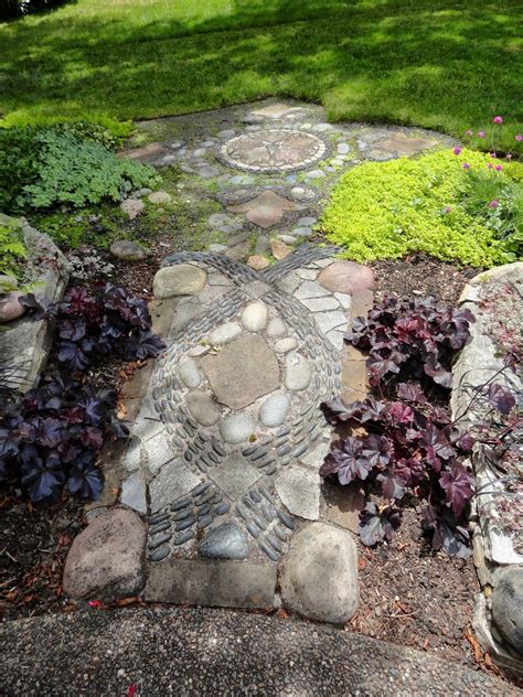 Nov 07, 2019 · line the path with edging and spread a couple of inches (5 cm.) of compacted crushed rock and 3 inches (7.6 cm.) of mortar for the base of the mosaic. Pebble Mosaic http://dangergarden.blogspot.com/ | Mosaic ...