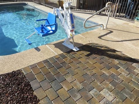 All public pools must have ada compliant pool lifts. Pool Chair Lift installed with a paver area to allow for ...