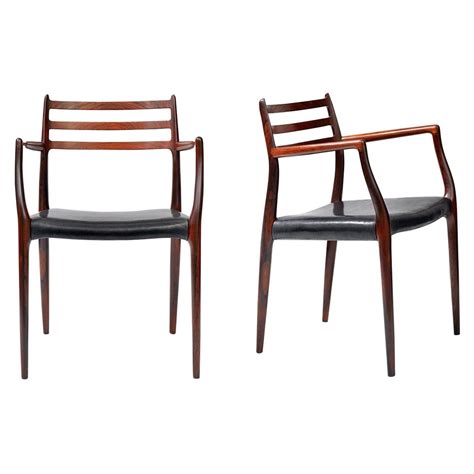 Pair Of Rosewood Model 62 Armchairs By Niels Moller 1962 For Sale At