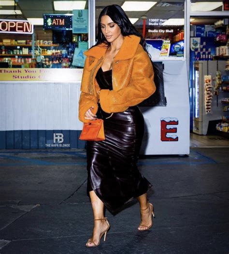 Kim Kardashian Spotted At A Gas Station In La Wearing Yeezy Orange