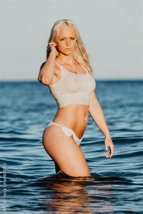 Sexy Woman In Wet T Shirt Playing On Water At Beach Over Sea Summer