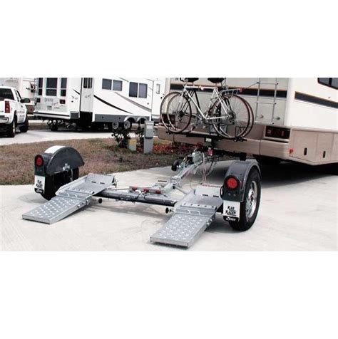 Commonly known as a car hauler, the trailers normally have two axles for stability and low (or no) rails along the edges. RV Towing | RV Hitches & Car Carriers | Lazydays RV