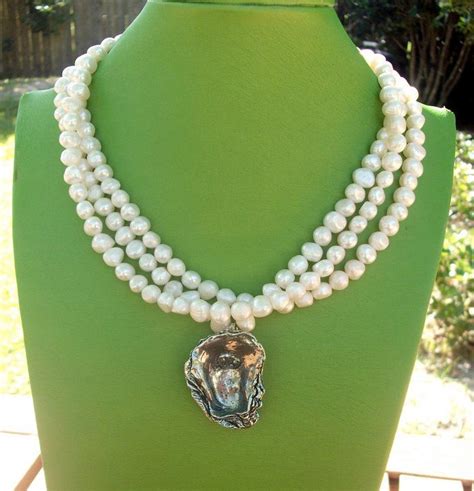 Oyster Pendant On 3 Strand Freshwater Pearl Necklace From Barrett House Available At Whimsy