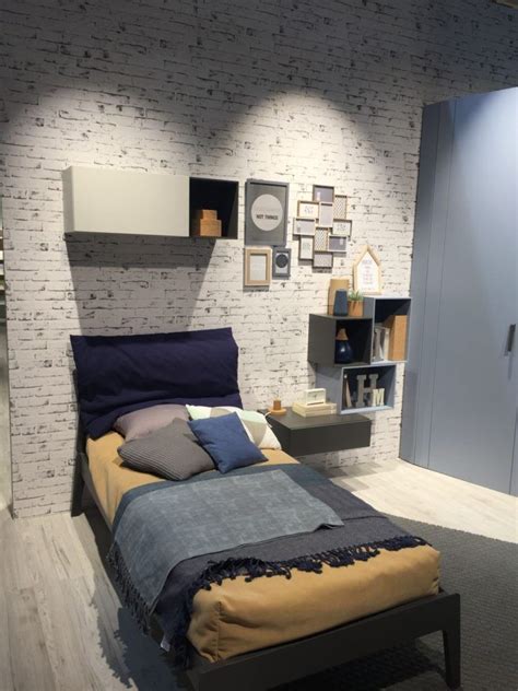 Simple teenage boy's room with solid colors and monogram used as an accent. 25 Kids and Teens Beds that Transform the Ordinary into ...