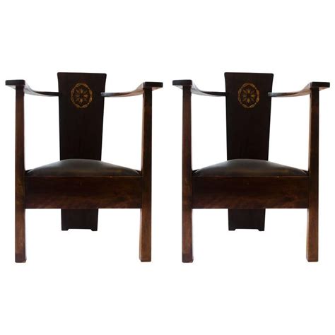 M H Baillie Scott A Pair Of Arts And Crafts Armchairs With Foliate And