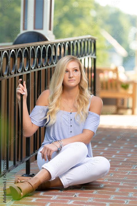 High School Senior Photo Of Blonde Caucasian Girl Outdoors Stock Photo