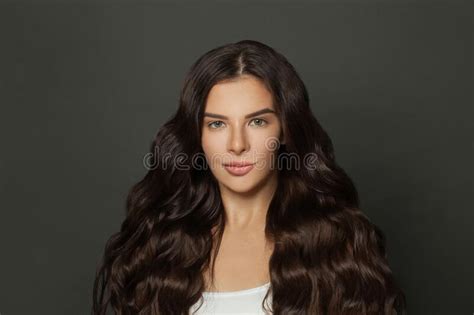 Brunette Woman With Perfect Long Volume Shiny Wavy Hair Portrait Stock