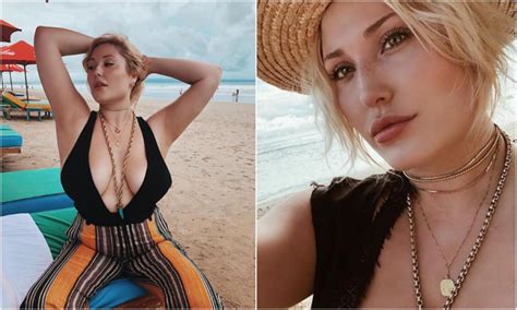 hayley hasselhoff shows off her huge cleavage in revealing swimwear on the beach as she poses