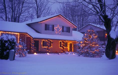 Snowy House With Christmas Lights Photo Wp02926