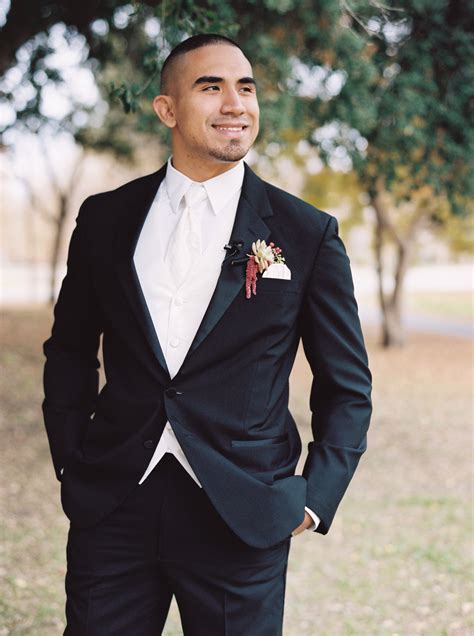 Elegant Black Suit With White Tie