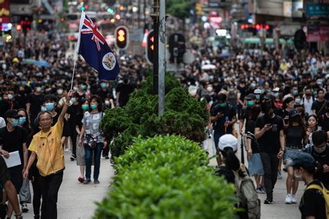 Police Fire Tear Gas Threaten Prison Time As Hong Kong Protests Enter