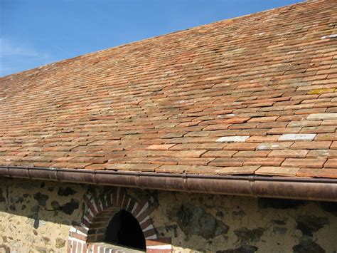 Terracotta roof cleaning is not easy. Reclaimed terracotta roof tiles from France | BCA Antique ...