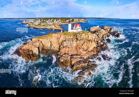 Nubble Lighthouse Island Off Of Maine Coast With Ocean Waves Stock