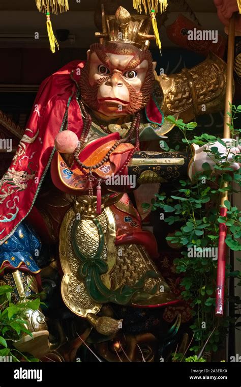 A Statue Of The Chinese Monkey King Sun Wukong Outside A Shop For