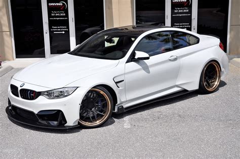 Every car manufacturer assigns an internal code designation to identify their vehicles. 2015 BMW M4 Vorsteiner GTRS4 Wide Body Stock # 5916 for sale near Lake Park, FL | FL BMW Dealer