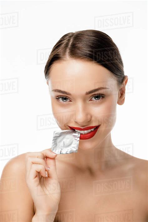 Beautiful Naked Girl Holding Condom And Smiling At Camera Isolated On White Stock Photo Dissolve