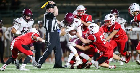 Heads in the rain (demo) 7. Prep football gallery: Hawks versus Mercer Island Friday ...