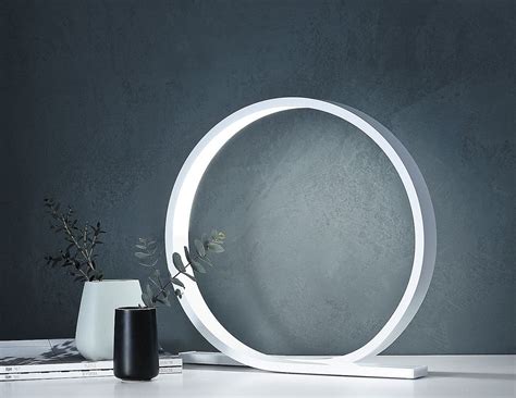 The lamp is finished with a white linen modified drum shade, for a classic yet minimalist silhouette. Loop Minimalist Table Lamp » Gadget Flow