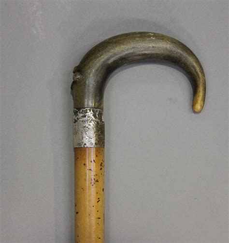 A Late 19th Century Rhino Horn Handled Walking Stick With A Silver