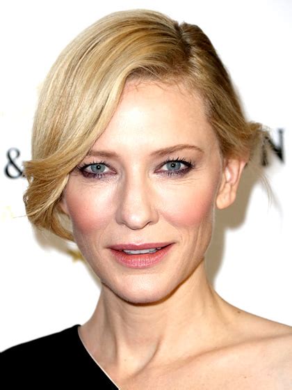 Her simple choppy waves have been tied up in a half ponytail with small strands of hair pulled out from the sides. 25 Hairstyles That Make You Look Younger | Women's Fashionesia