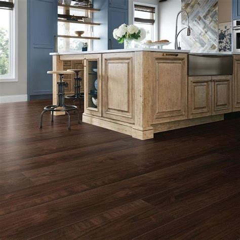 For realistically patterned surfaces, sturdy wear layers, cutting edge locking systems. Found on Bing from www.lowes.com Westchester Walnut ...