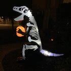 The Holiday Aisle Skeleton Dinosaur With Pumpkin Yard Halloween