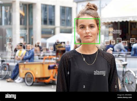 Young Woman Picked Out By Face Detection Or Facial Recognition Software