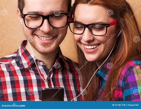 Young Couple Listening Music Stock Photo Image Of Outdoors