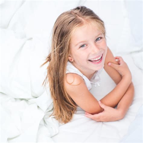 Six Year Old Girl In A White Bed Stock Image Image Of Small Portrait