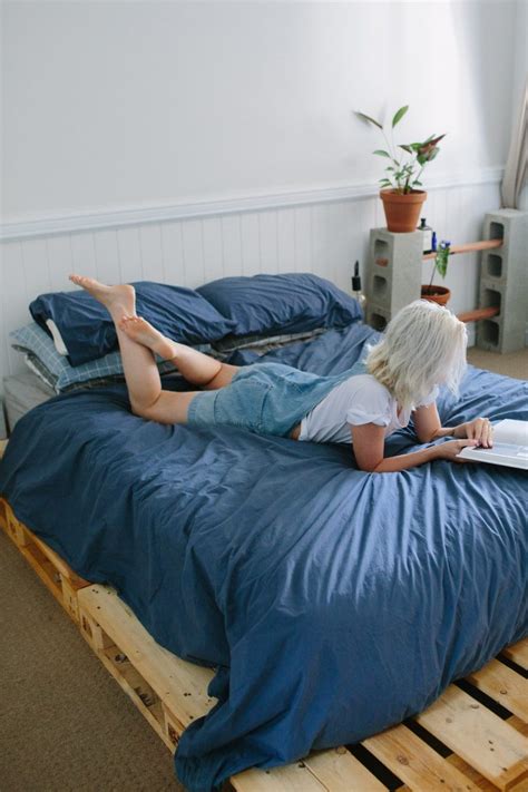 With everything ready to go and your protective gear on, follow these steps to create your fabulous new bed frame. DIY Pallet Bed | A Pair & A Spare