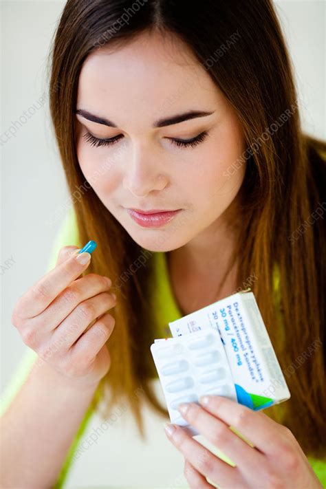 Woman Taking Medicine Stock Image C032 9075 Science Photo Library
