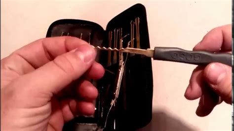 A lock pick and a torque wrench. Goso 24pcs Single Hook Lock Picking Set Locksmith Tools Lock Pick Kit - YouTube