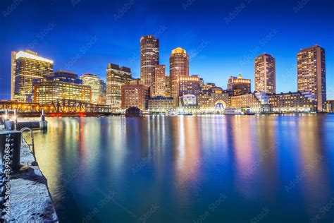 The Boston Skyline At Night Located In Fan Pier Park Boston