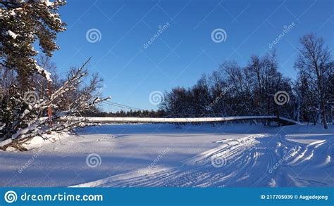 Snow Covered Bridge Over Valan River In Are Valadalen In Jamtland In