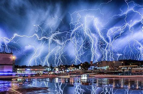 Hundreds Of Lightning Bolts Electrifying City Skyline Captured On