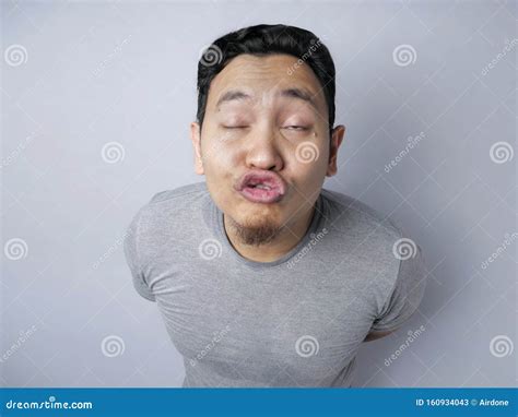 Funny Silly Asian Man Trying To Kiss Stock Image Image Of Cute Funny 160934043