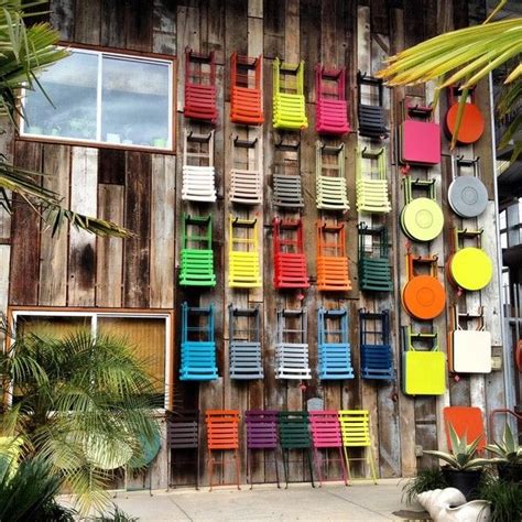 Each chair is constructed of curved lacquered steel slats on a lightweight steel frame. Fermob Bistro Chairs and Tables when not in use ... it's ...