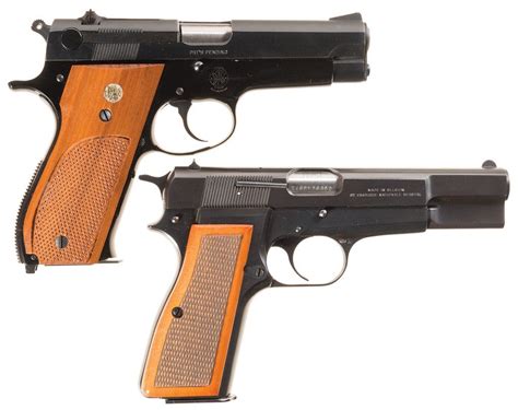 Two Semi Automatic Pistols A Smith And Wesson Model 39 Pistol