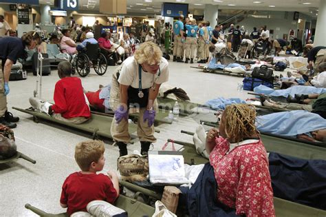 Eon Images Hurricane Katrina Evacuees From New Orleans At Local Airport
