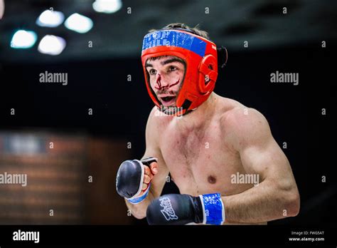 Fighter Boxing Bloody Face During A Fight In Ring Stock Photo