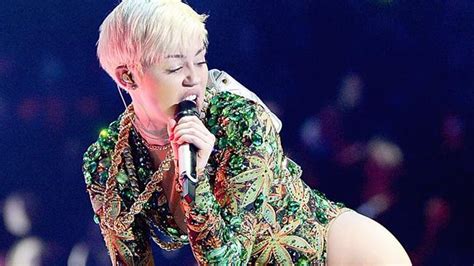 miley cyrus lets fan squeeze her boobs in photo au — australia s leading news site