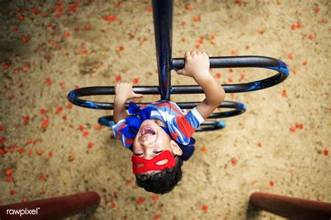 Download Premium Image Of Little Boy Playing Superhero At The