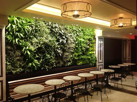 It generates oxygen while offering a visual focal point that's arguably as stunning as, and more affordable than, a piece of fine art. Green wall systems for exterior areas