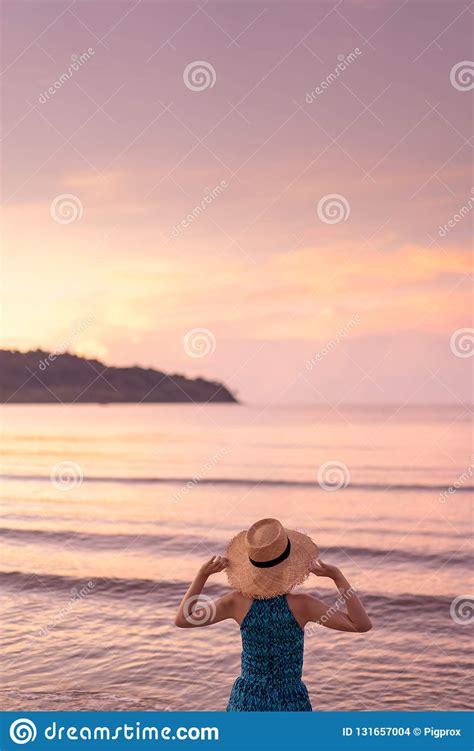 Woman Relaxing On The Beach With Sunset In Koh Kood Island Thailand