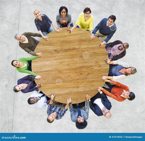 Multiethnic Diverse People In A Circle Holding Hands Stock Photo My