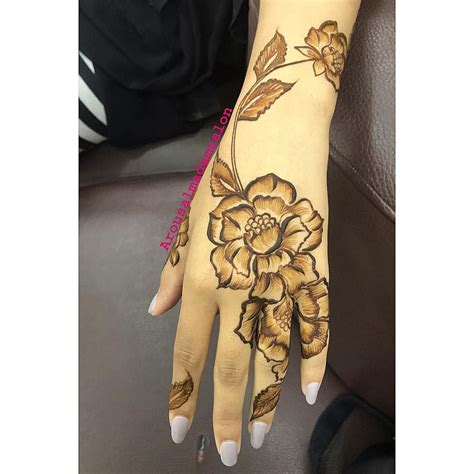 Image May Contain One Or More People Rose Mehndi Designs Floral