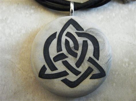Celtic Symbol For Sisterhood Hand Carved On A Grey Pearl