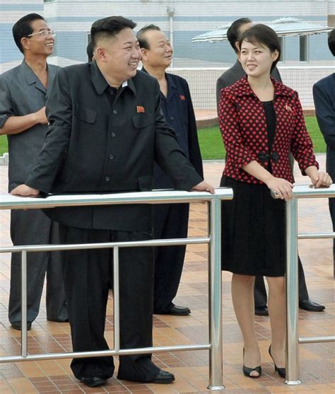 North korean leader kim jong un and his wife ri sol ju attend the opening ceremony of the rungna people's pleasure ground on rungna islet along the taedong river in pyongyang in this july 25, 2012 photograph released by the north's kcna to reuters on july 26, 2012. Hey, Isn't That… Kim Jong Un's Wife? | PBS NewsHour