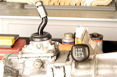 For me, i tapped the top of the shifter and essentially helicoiled the shift knob, but a good solid chunk of that weldable, sandable metal patching. How to remove AX15 upper shifter from tower?? - JeepForum.com